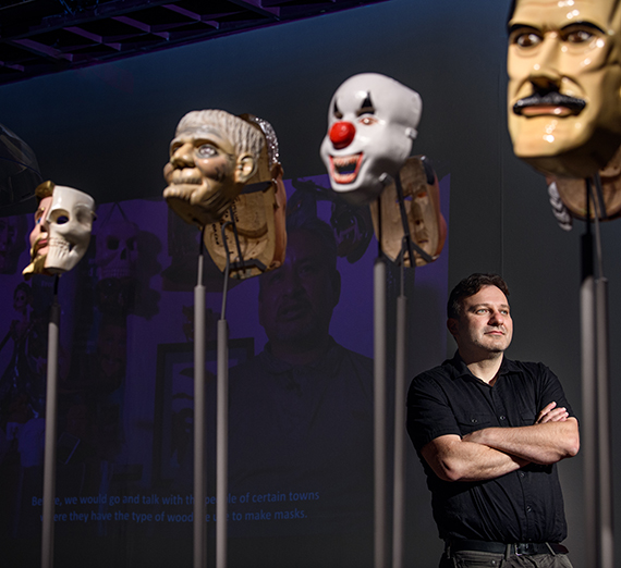 Pavel Shlossberg with some Mexican masks at the Northest Museum of Arts and Culture
